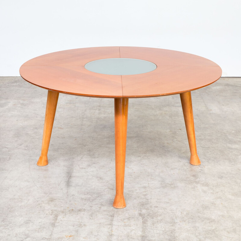 Vintage round dining table in teak 1990s