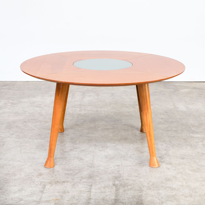 Vintage round dining table in teak 1990s