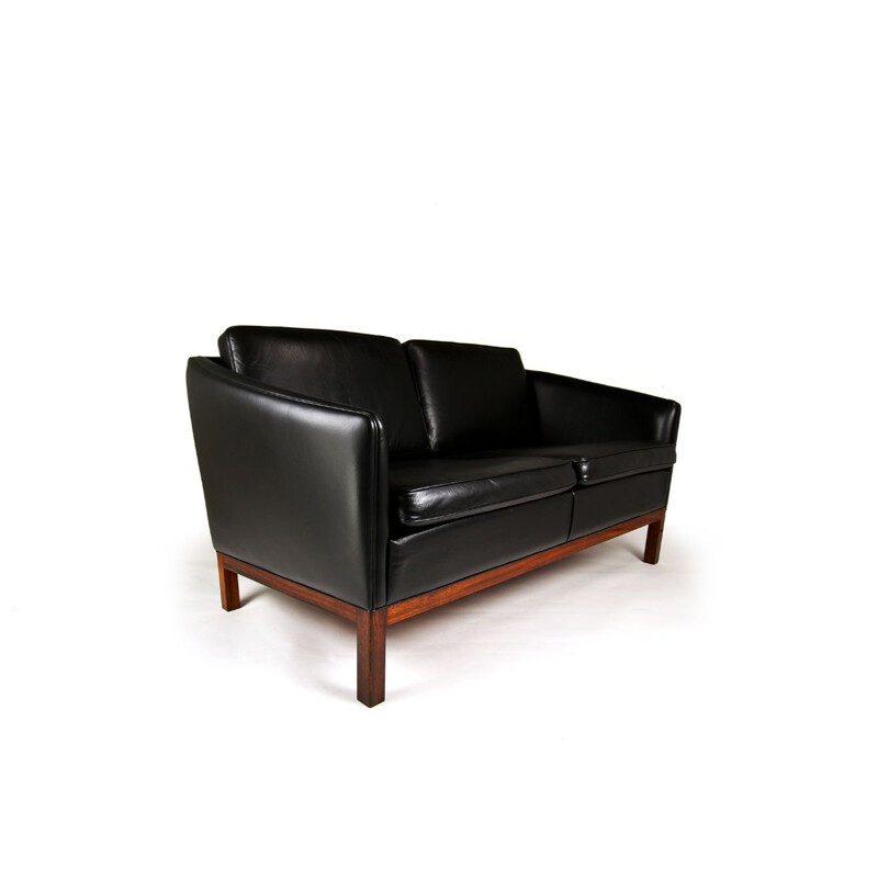 Vintage sofa black leather & rosewood by Illum Wikkelso for Holger Christiansen, Denmark 1950s