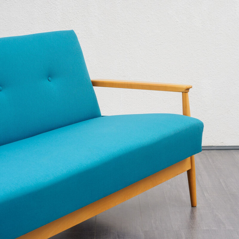 Vintage petrol blue 3 seaters sofa with fold-out function in cherrywood 1960s 