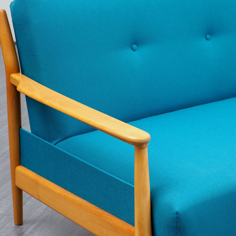 Vintage petrol blue 3 seaters sofa with fold-out function in cherrywood 1960s 