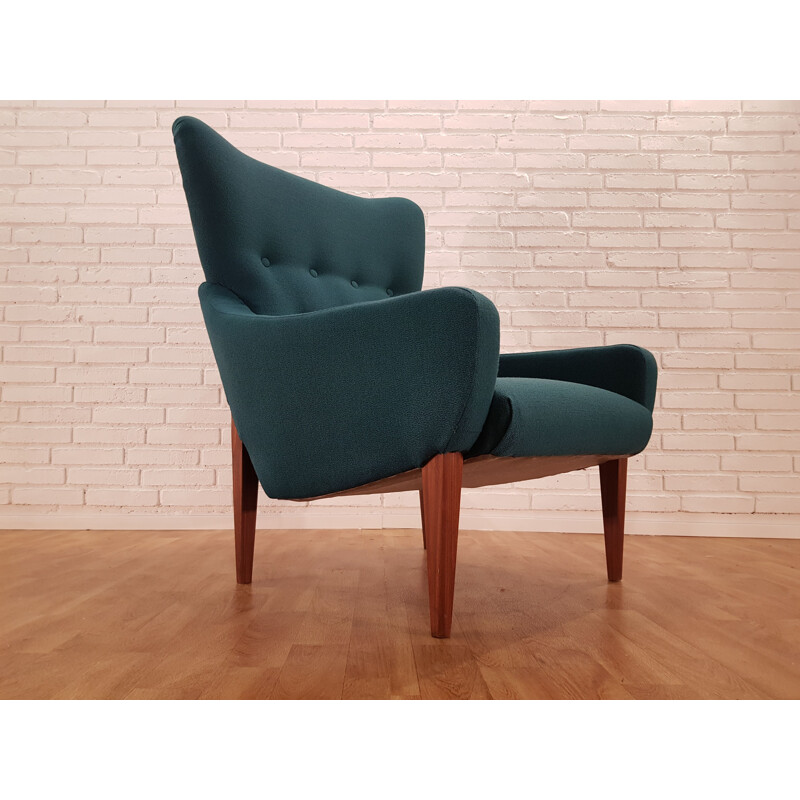 Vintage Danish designed armchair in teak wood