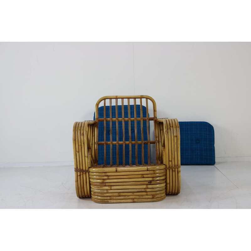 Vintage lounge chair in rattan by Paul Frankl