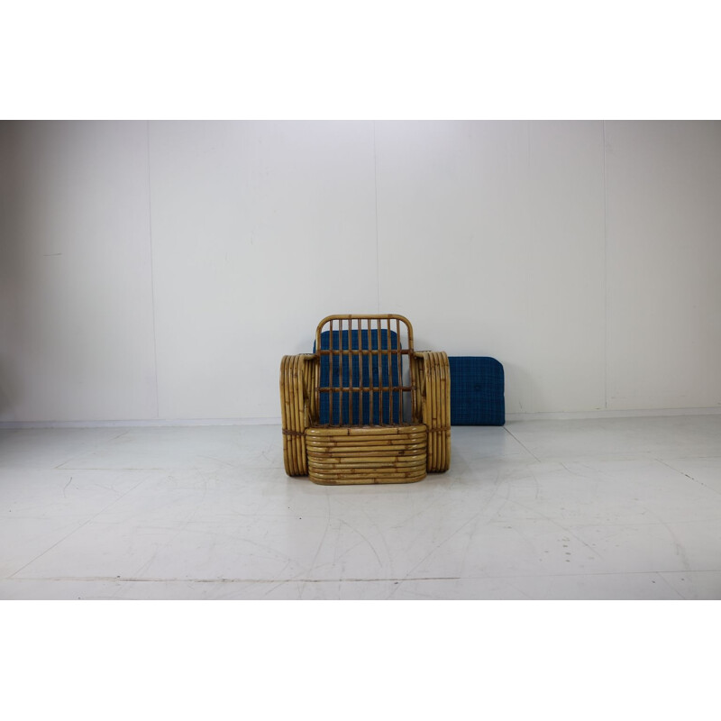 Fauteuil lounge vintage en rotin par Paul Frankl