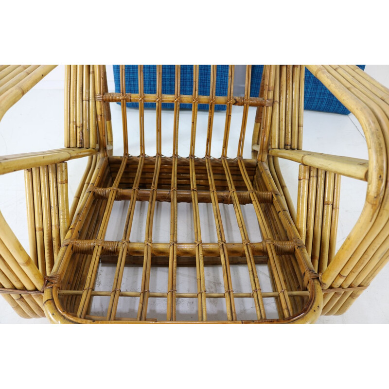 Vintage lounge chair in rattan by Paul Frankl
