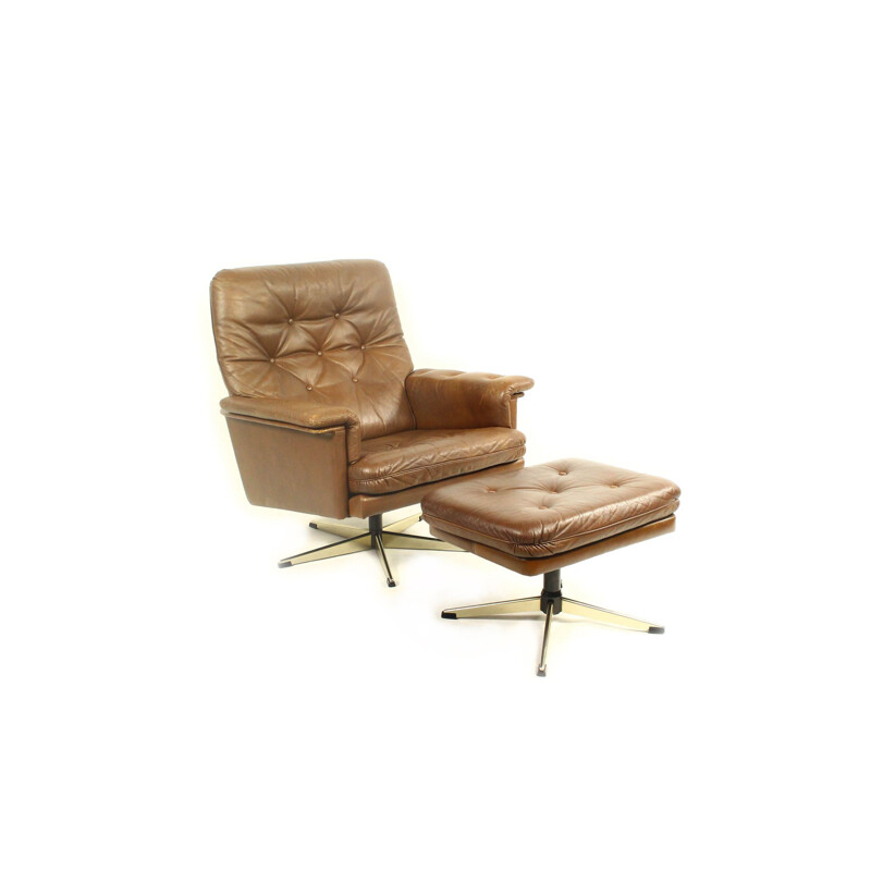 Vintage leather swivel armchair with ottoman,1970