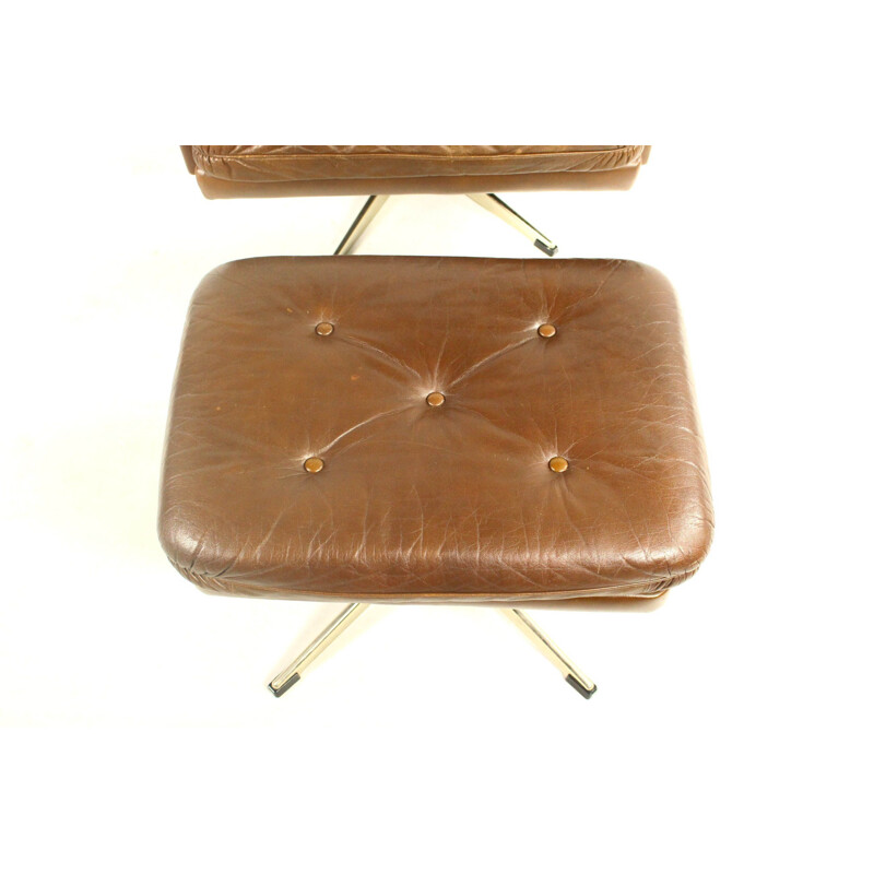Vintage leather swivel armchair with ottoman,1970