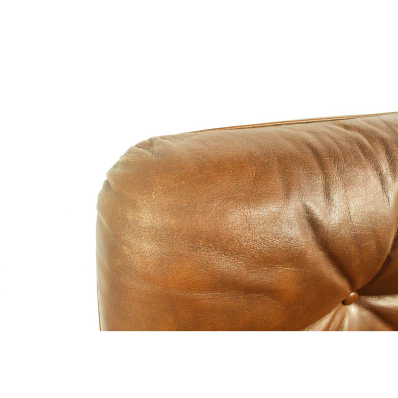 Vintage leather swivel armchair with ottoman,1970