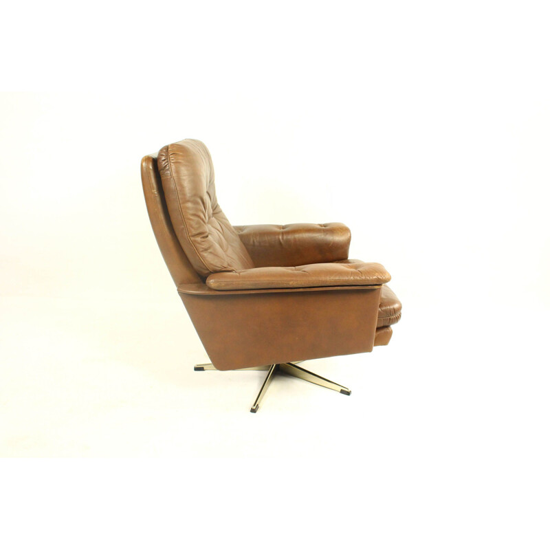 Vintage leather swivel armchair with ottoman,1970