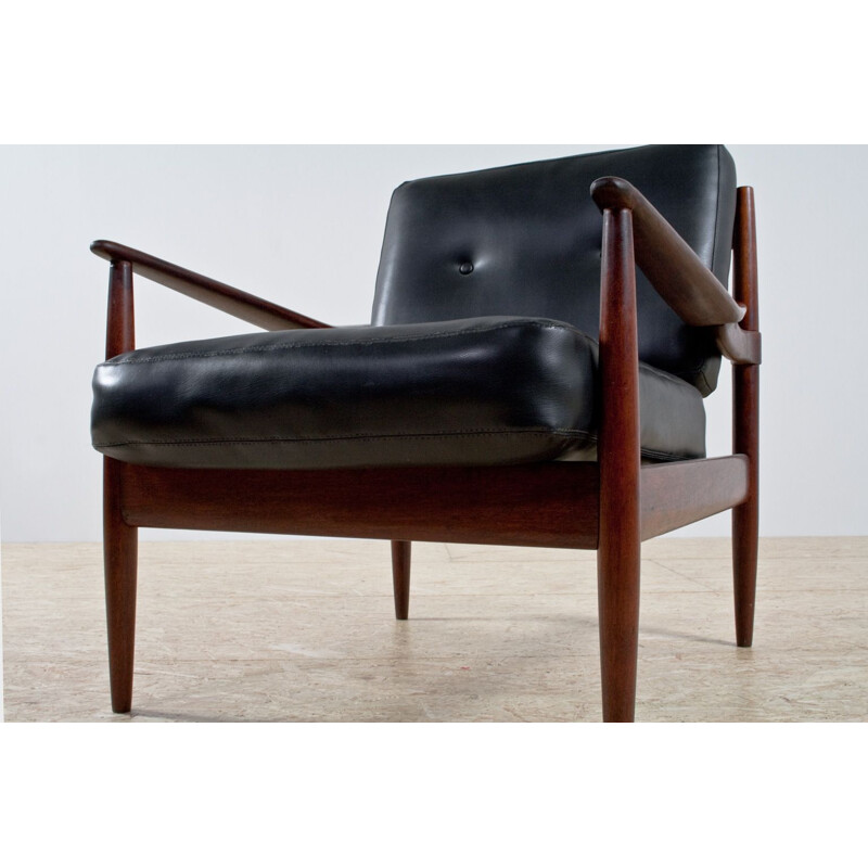 Pair of rosewood and black leatherette armchairs by Grete Jalk