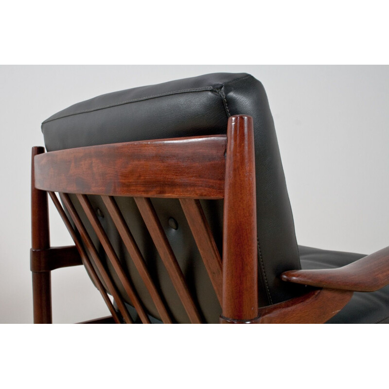 Pair of rosewood and black leatherette armchairs by Grete Jalk