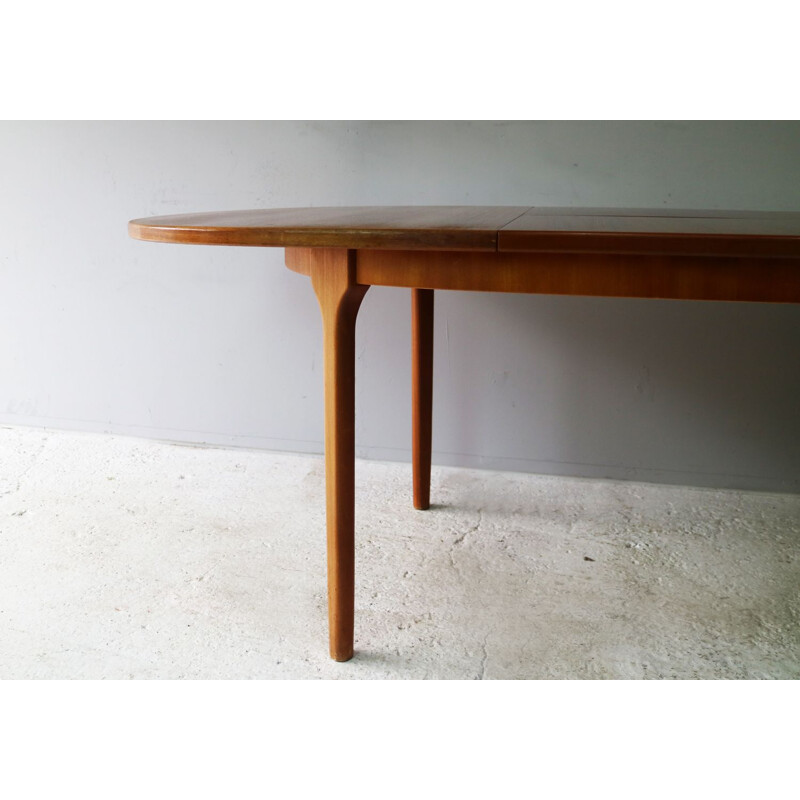 Vintage extending teak dining table by McIntosh