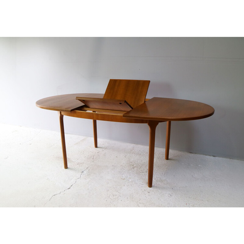 Vintage extending teak dining table by McIntosh