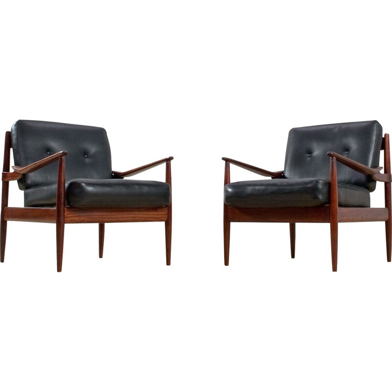 Pair of rosewood and black leatherette armchairs by Grete Jalk