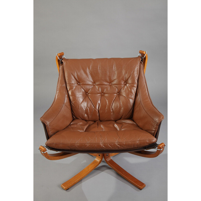Falcon armchair in brown leather by Sigurd Ressell