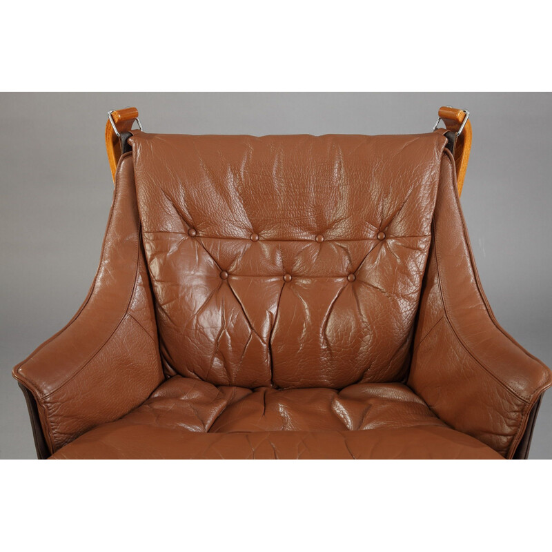 Falcon armchair in brown leather by Sigurd Ressell