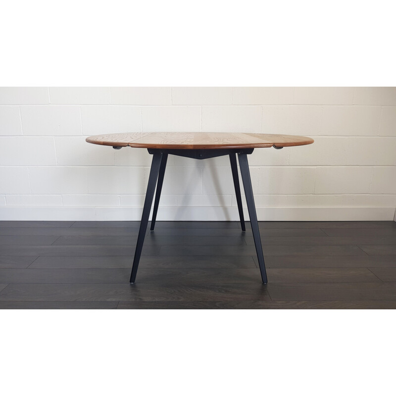 Vintage round drop leaf dining table by Lucian Ercolani for Ercol