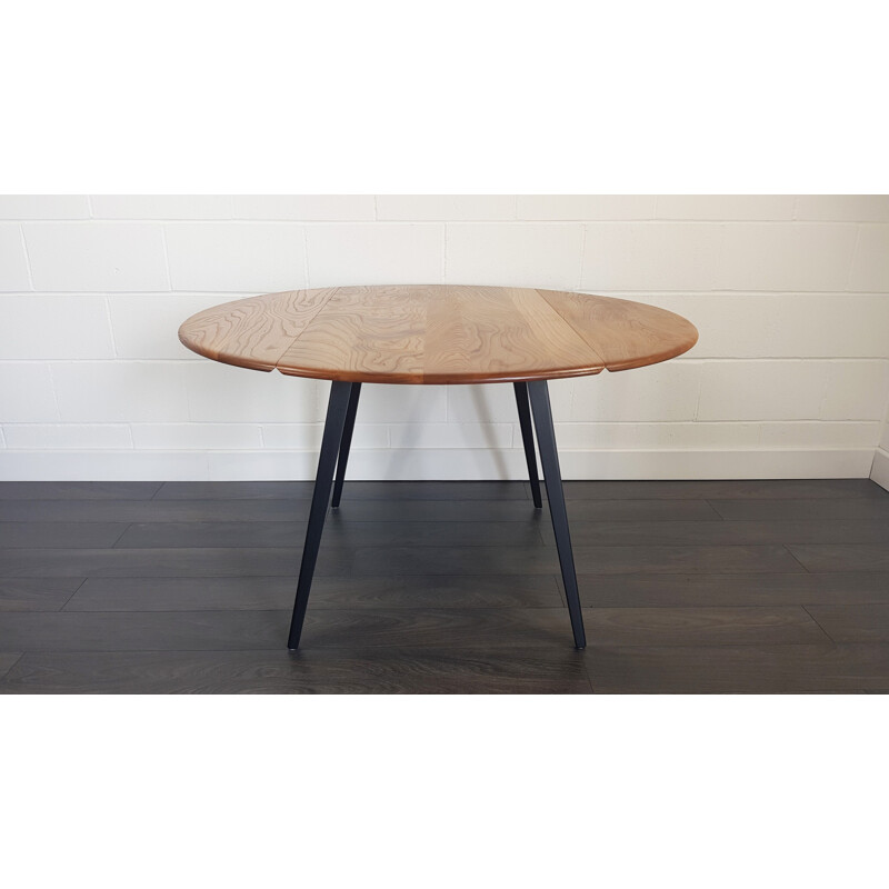 Vintage round drop leaf dining table by Lucian Ercolani for Ercol