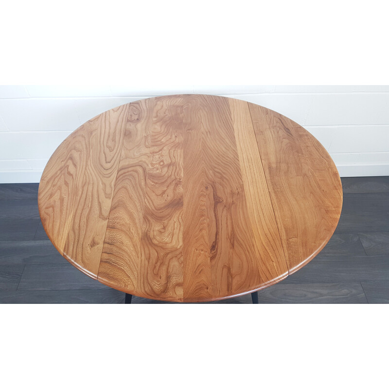 Vintage round drop leaf dining table by Lucian Ercolani for Ercol