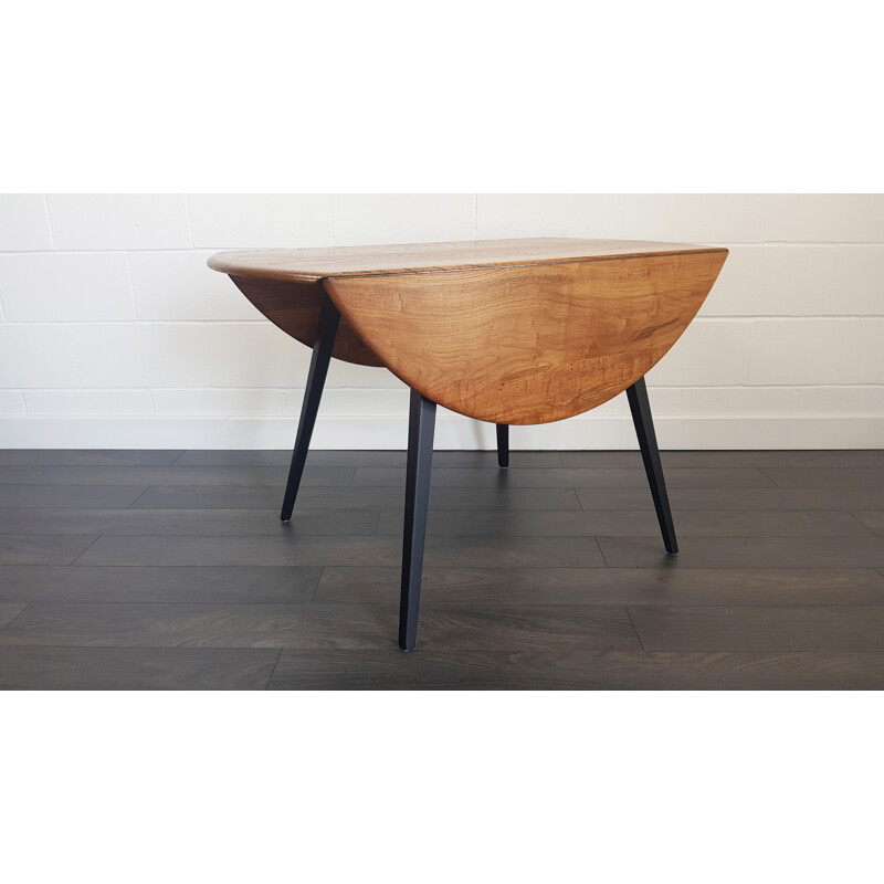 Vintage round drop leaf dining table by Lucian Ercolani for Ercol