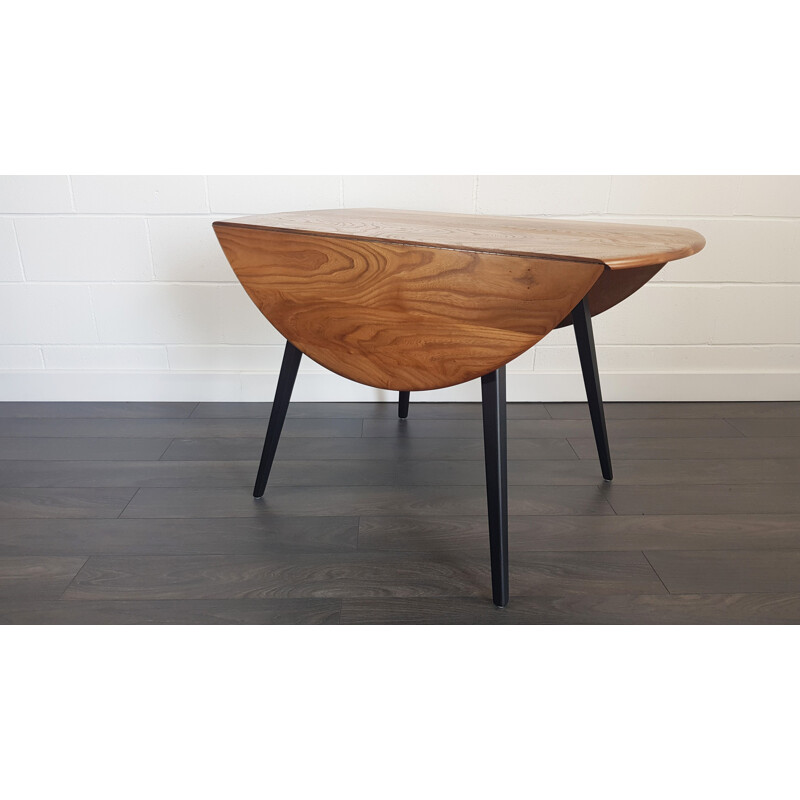 Vintage round drop leaf dining table by Lucian Ercolani for Ercol