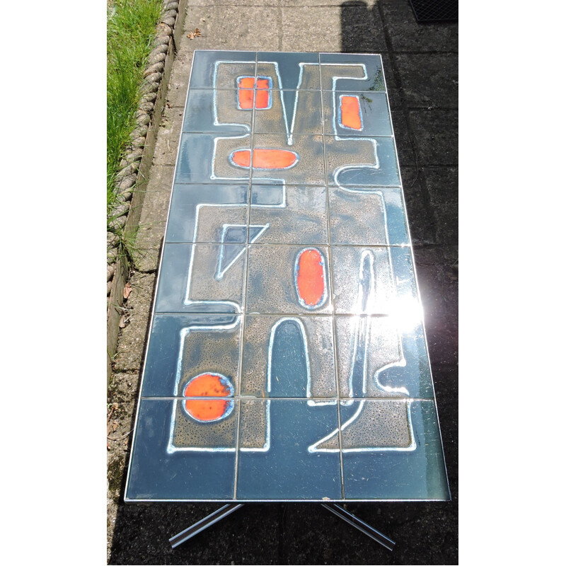 Vintage coffee table in blue green and orange ceramics and chrome 1960