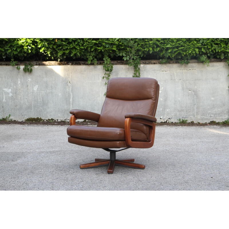 Vintage swivel armchair in brown leather 1950