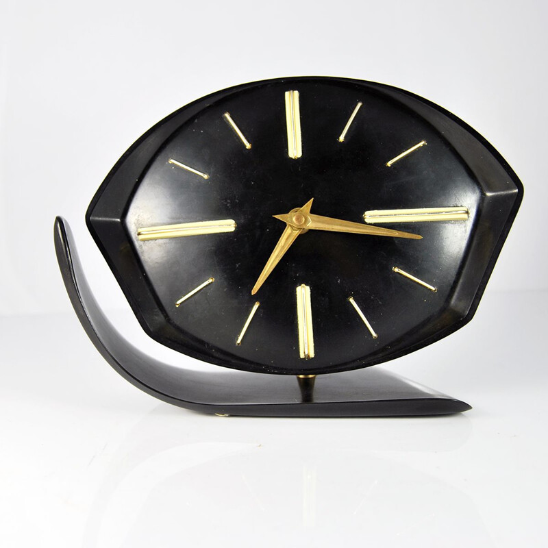 Horloge vintage en bakélite et en laiton 1950