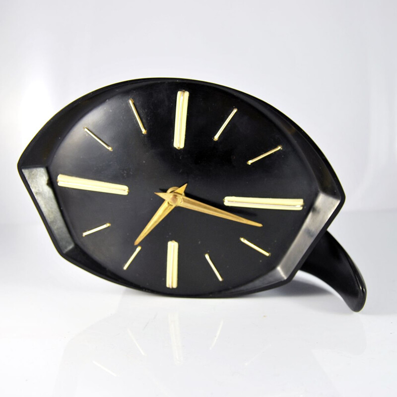 Horloge vintage en bakélite et en laiton 1950