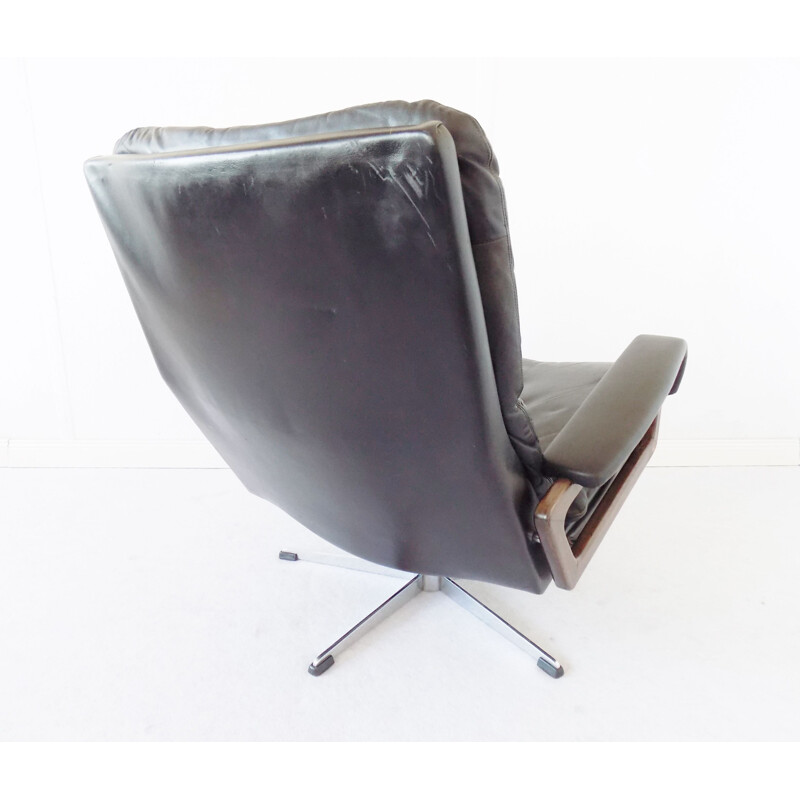 Vintage black Strässle king chair by Andre Vandenbeuck