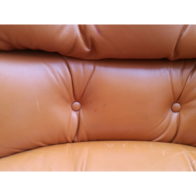 Vintage swivel leather armchair by Charles Pollock 1970