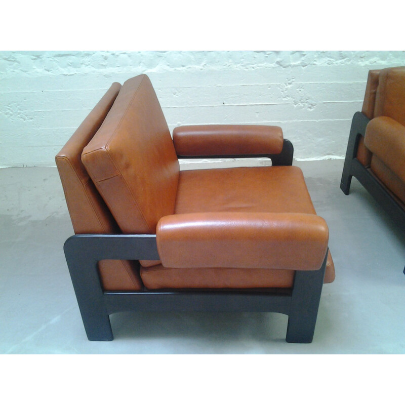 Paire de fauteuils vintage en cuir cognac