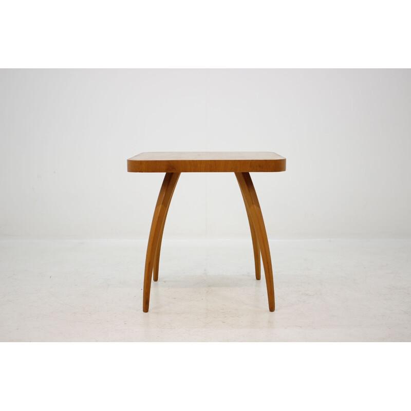 Vintage coffee table Spider in oak by J. Halabala 1950s