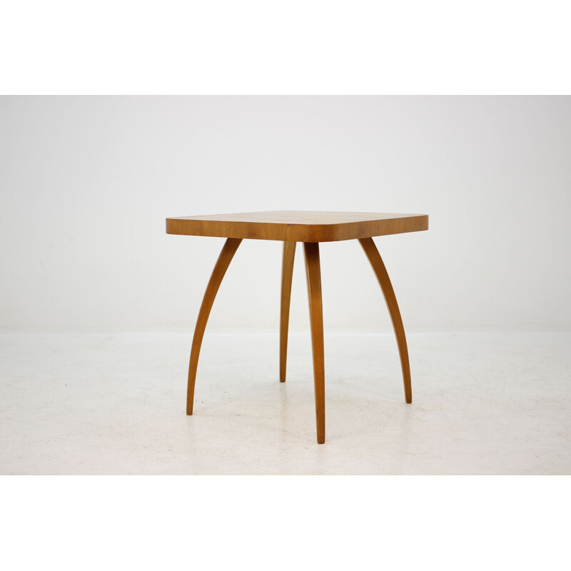 Vintage coffee table Spider in oak by J. Halabala 1950s