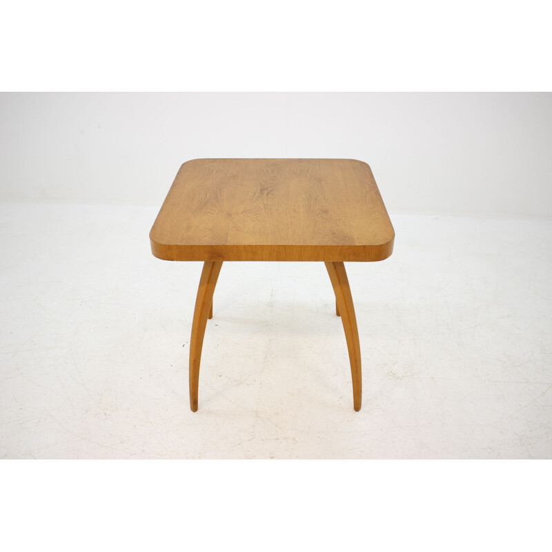 Vintage coffee table Spider in oak by J. Halabala 1950s