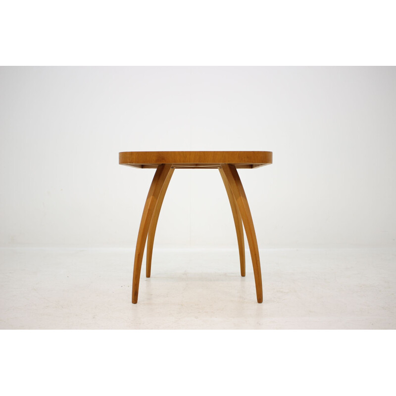 Vintage coffee table Spider in oak by J. Halabala 1950s