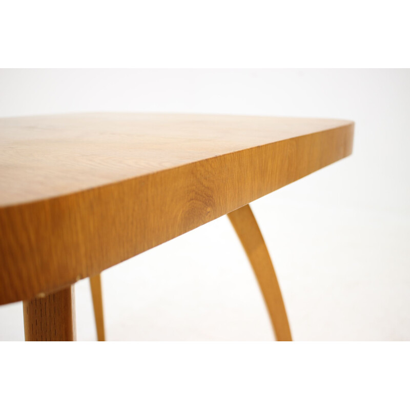 Vintage coffee table Spider in oak by J. Halabala 1950s