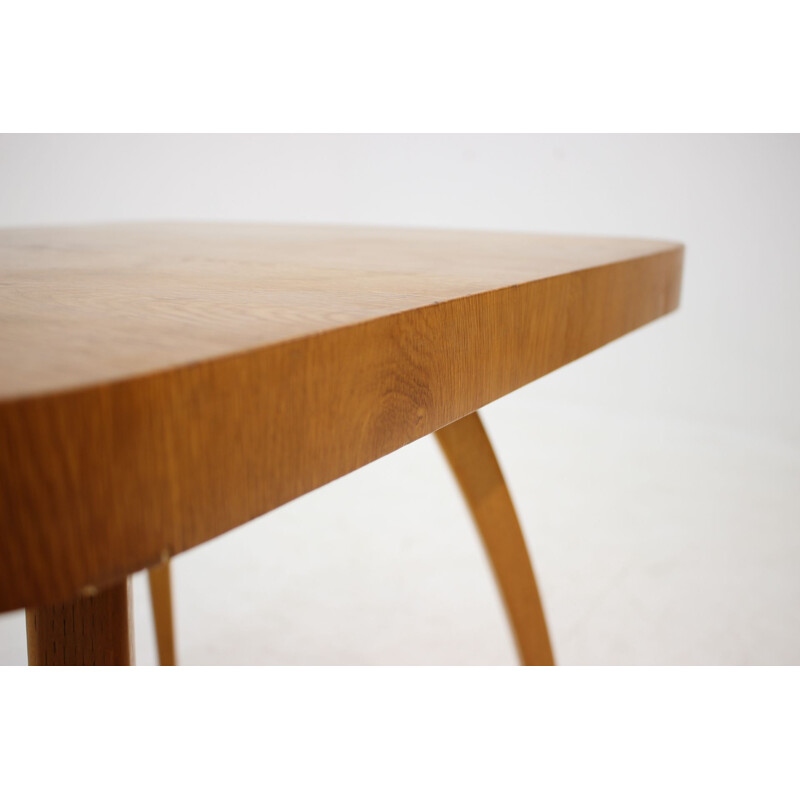 Vintage coffee table Spider in oak by J. Halabala 1950s