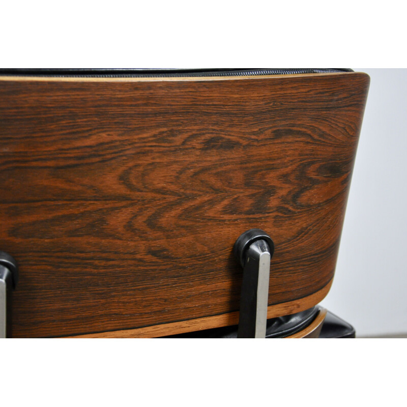 Fauteuil vintage Lounge chair de Eames pour Miller en palissandre et cuir noir 1970