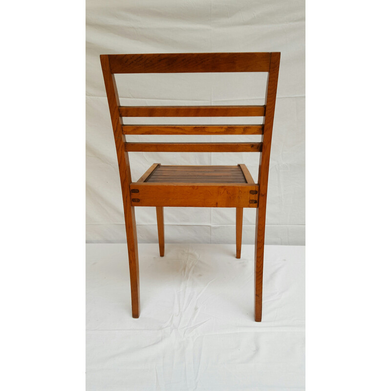 Pair of oakwood dining chairs, René GABRIEL - 1940s