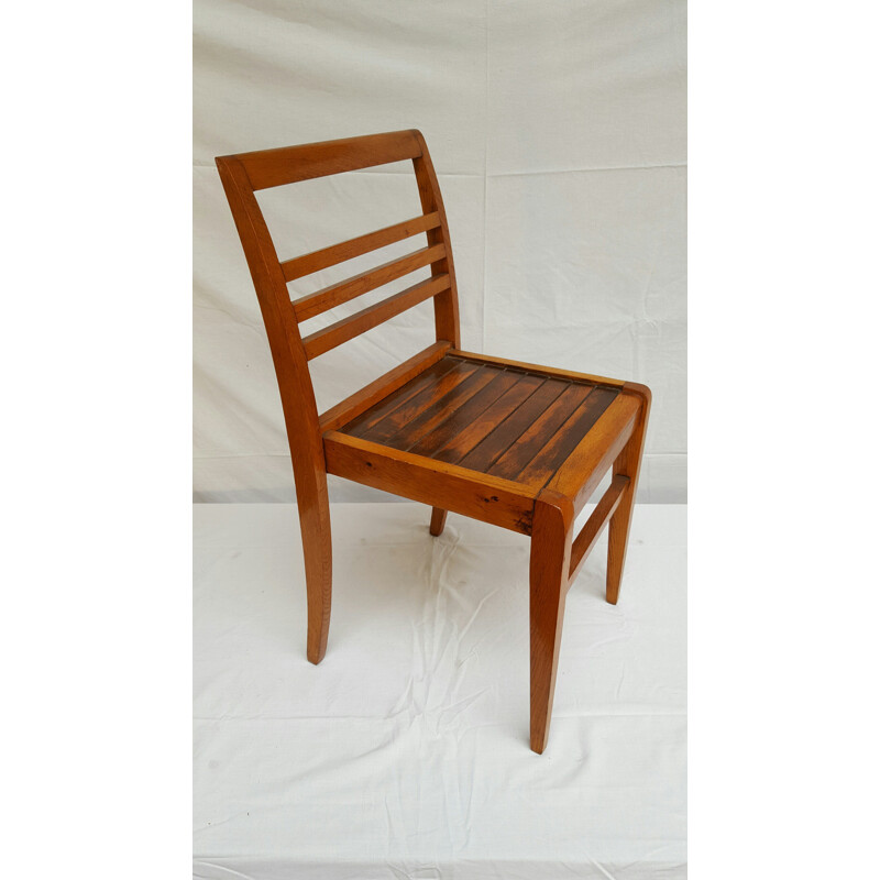Pair of oakwood dining chairs, René GABRIEL - 1940s