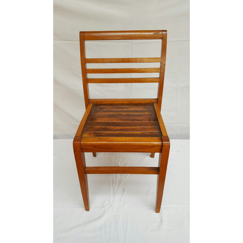 Pair of oakwood dining chairs, René GABRIEL - 1940s