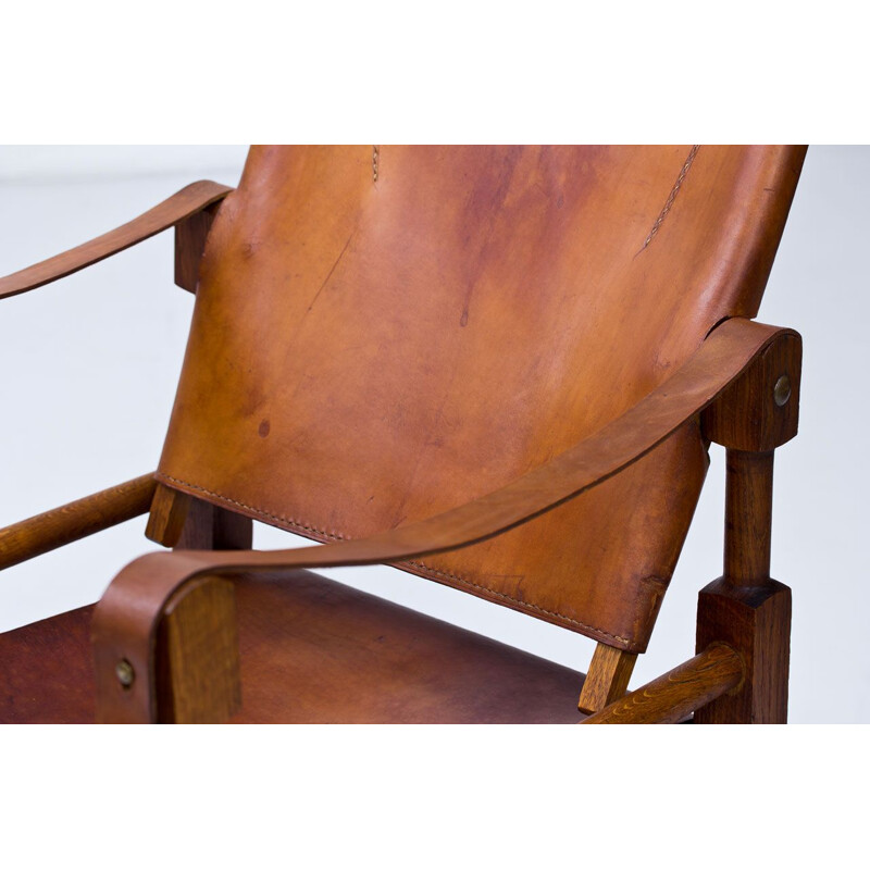 Vintage Safari armchair for Wohnbedarf in brown leather and oakwood 1950