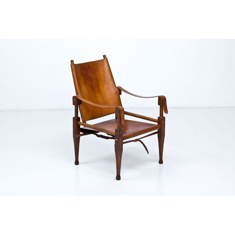 Vintage Safari armchair for Wohnbedarf in brown leather and oakwood 1950