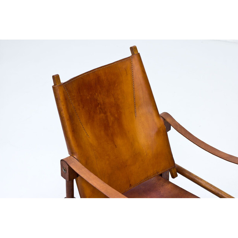 Vintage Safari armchair for Wohnbedarf in brown leather and oakwood 1950