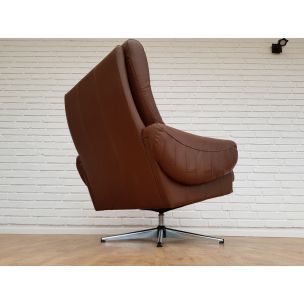 Vintage swivel brown leather armchair 1970s 