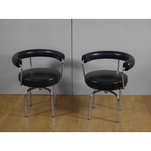 Pair of vintage LC7 armchairs by Le Corbusier Perriand and Jeanneret in black leather and steel