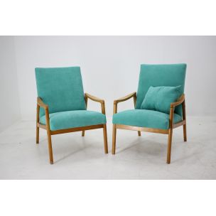 Pair of vintage armchairs in green fabric and wood 1960s