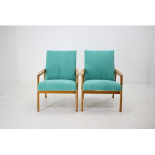 Pair of vintage armchairs in green fabric and wood 1960s