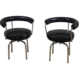 Pair of vintage LC7 armchairs by Le Corbusier Perriand and Jeanneret in black leather and steel